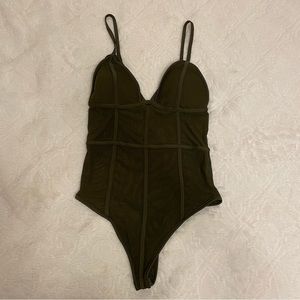 Green bodysuit with mesh